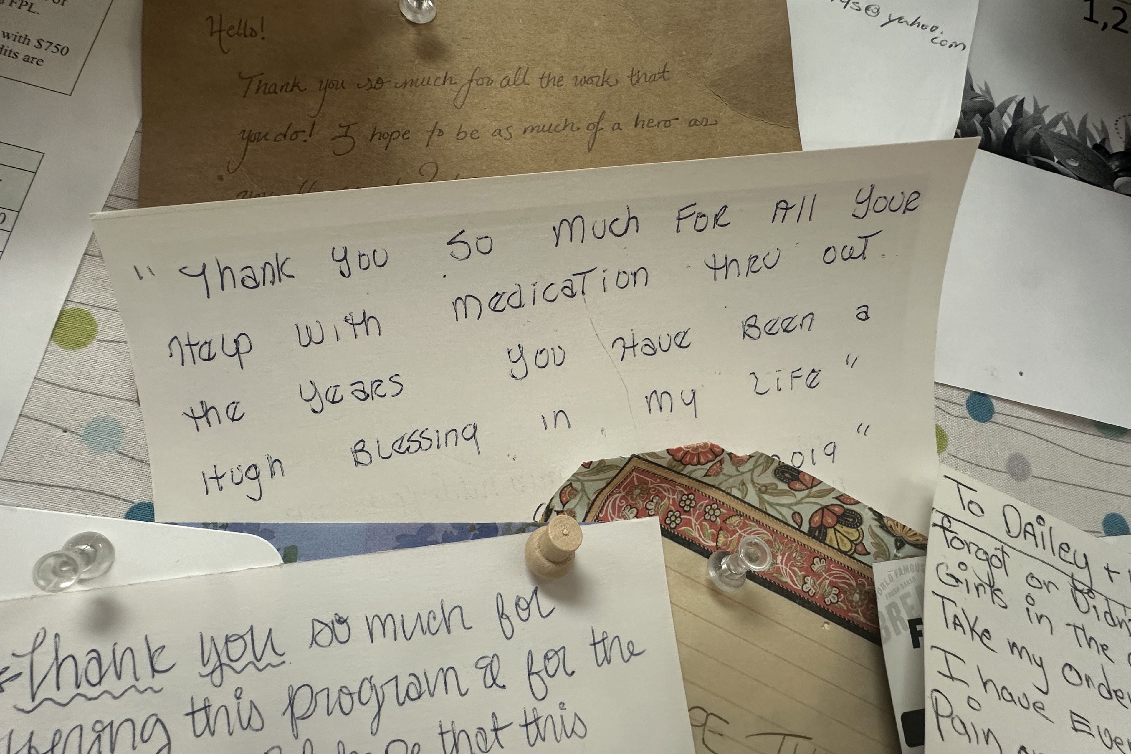 Thank-you notes are pinned to the wall at the Wyoming Medication Donation Program in Cheyenne, Wyoming. The note at in the center of the board reads, "Thank you so much for all your help with medication thru out the years. You have been a huge blessing in my life."